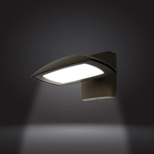 A modern wall mounted outdoor light fixture with a curved, shield-like shade and a rectangular illuminated panel, shown against a dark gray background with a soft light beam projecting downward.